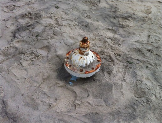 Fire hydrant burried in sand in Long Beach