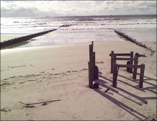 Long Beach life-guard station used to be here.  Old wooden breakers start to reappear from erosion.