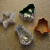 Line the cookie cutters with aluminum foil and spray with cooking oil. Line the cookie cutters with aluminum foil and spray with cooking oil.