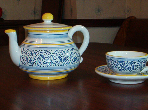 A teapot and saucer set helps make a beautiful team time look.