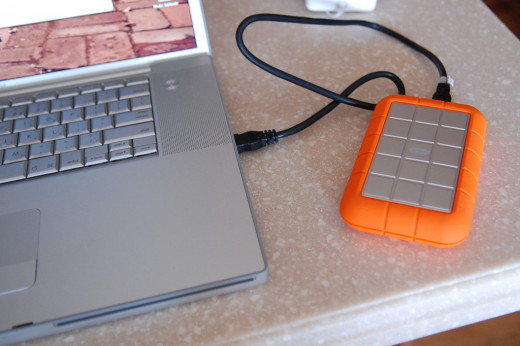 Portable Hard Drive Connected to Laptop