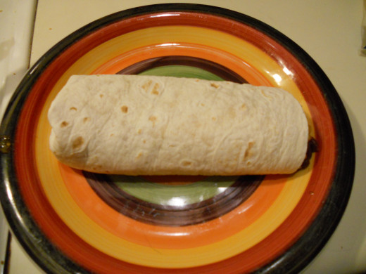 The finished burrito.  I now realize I should have taken a close-up with the delicious filling just peeking out of one end.  But, I didn't, so you'll have to use your imagination.