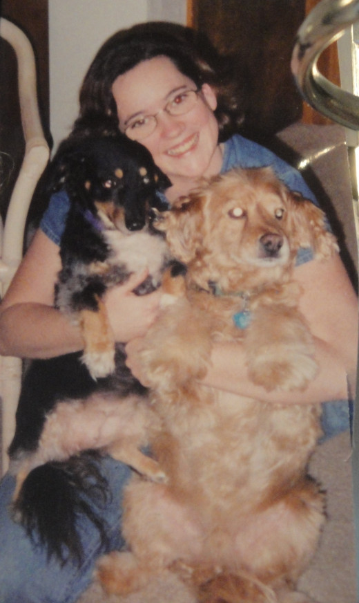 Me many years ago, with Lady (black) and Corky (gold).