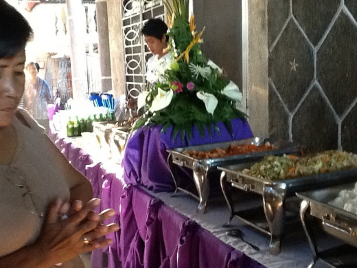 Food caterer setting the food to be served