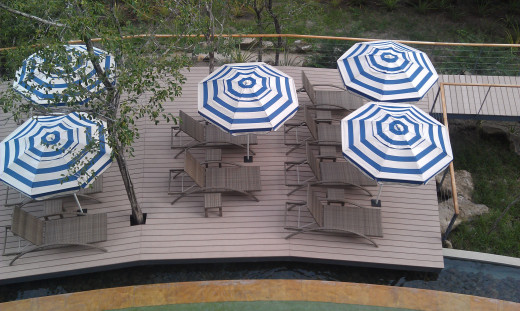 Umbrellas at poolside at Rio Perdido resort near Bagaces, Guanacaste, Costa Rica.