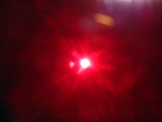 Using a red filter I captured this image of our Sun with an unusual anomaly near it.