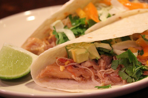 Use leftover chicken or roasted chicken in tacos with cilantro and lime.