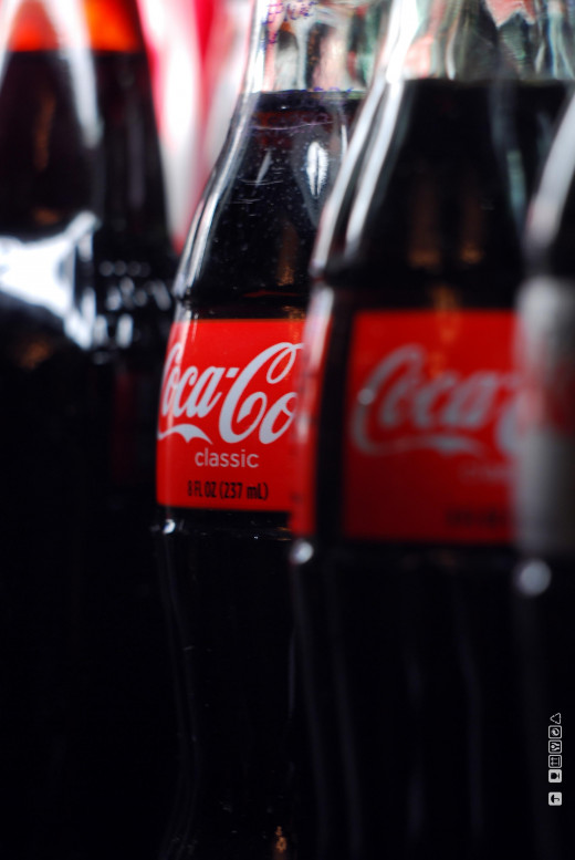 Coca Cola, a substitute good of Pepsi Cola, but with a strong brand