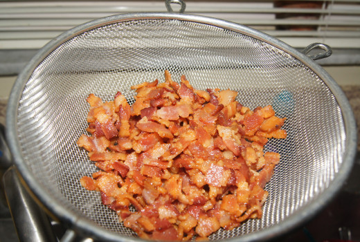 Drain bacon and put back into the pot.