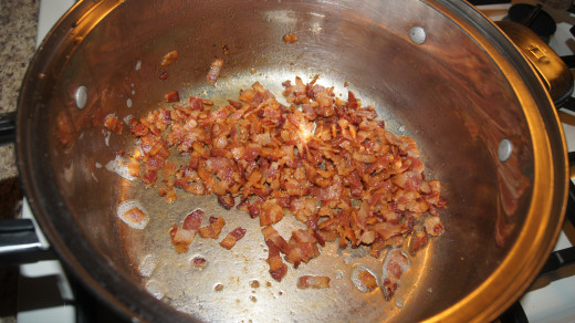 Add bacon back to the pot.