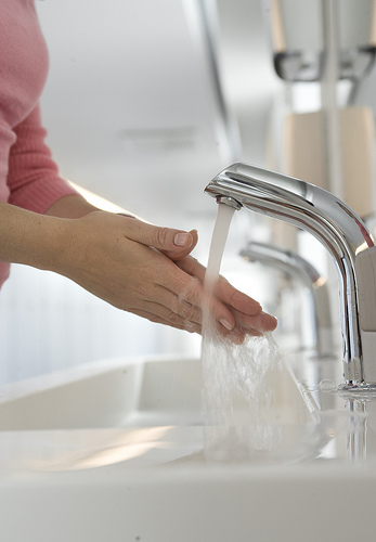 Washing hands.