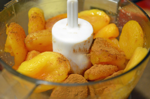 Combine steamed apricots and cinnamon.