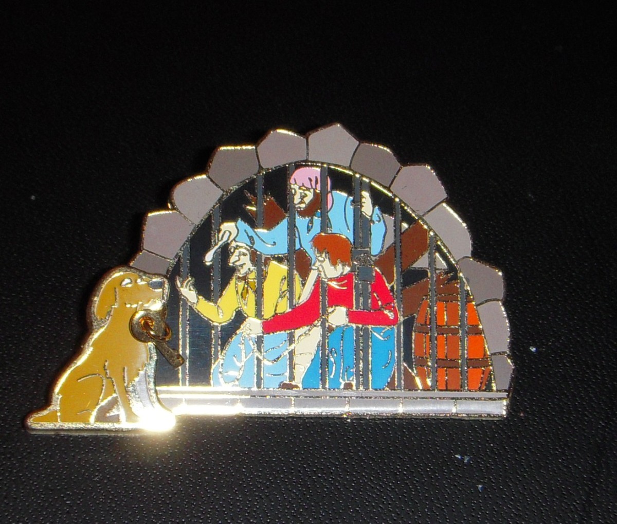 Pirates of the Caribbean pin with subtle dangle feature. Note the key that the dog holds.