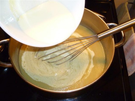 Whisk the egg and cream mixture into the soup. 
