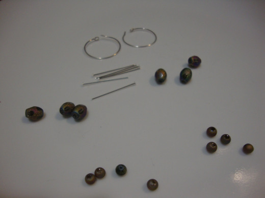 Hoop earrings, bi-pins, beads.