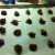 Drop by the teaspoonfuls onto a greased or parchment paper lined cookie sheet. Pop into the oven for eight minutes.