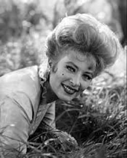 What are some interesting facts about Amanda Blake?