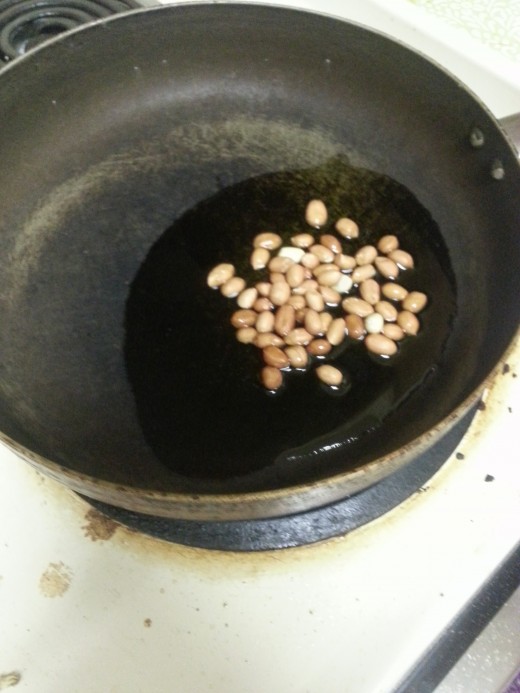 Add peanut to oil
