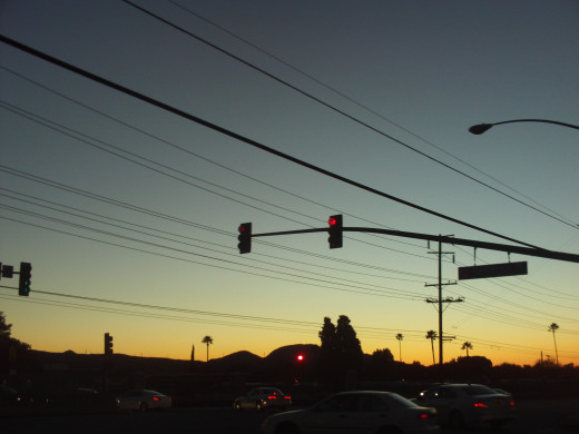 Sunset and traffic lights in the Inland Valley.
