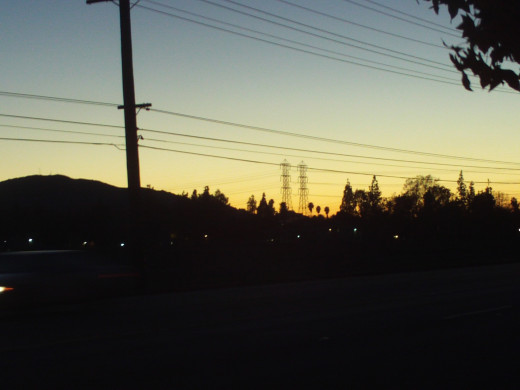 Telephone wires at sunset.