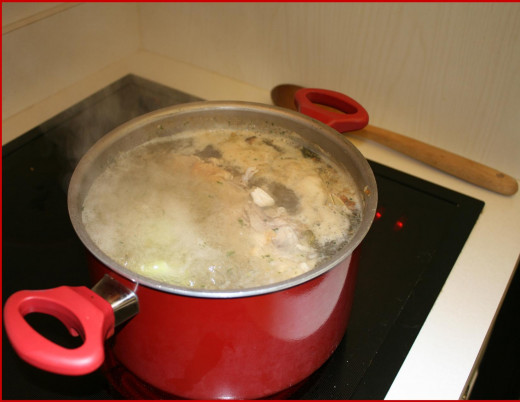 Boil then reduce to simmer. In 3-4 hours when broth is reduced by 25% to 33% it is ready.