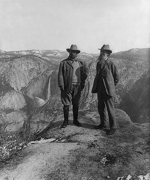 U.S. President Theodore Roosevelt (left) and nature preservationist John Muir were photographed on Glacier Point in Yosemite National Park in 1906. Upper and lower Yosemite Falls are in the background.