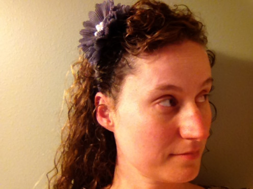 Do wear a smaller fascinator when your hair is down.