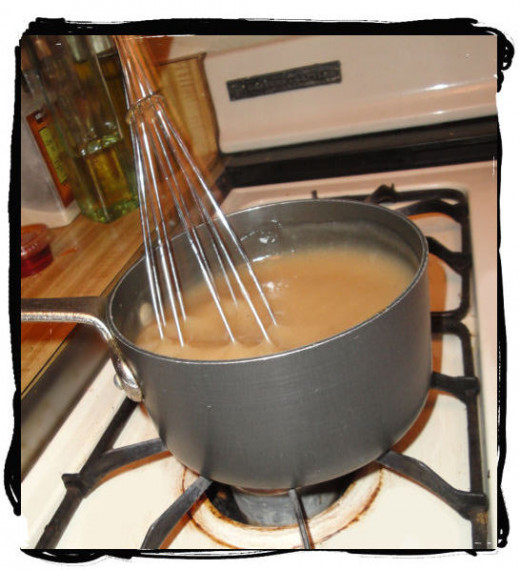 Simmer slowly, stirring frequently to avoid lumps. Gravy will thicken upon cooking.