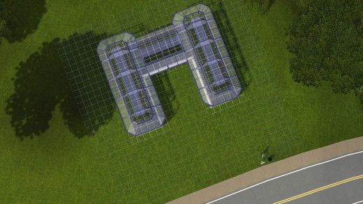 Aerial view of sims 3 greenhouse, showing how the roof becomes clear to allow the player to see in to the greenhouse.