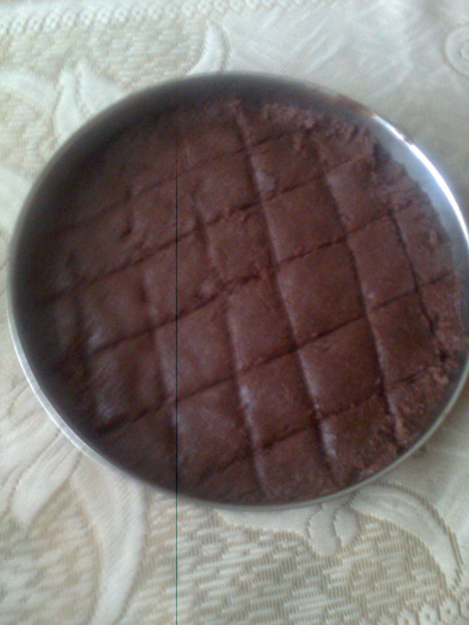 The mixture is tranferred to a plate and cut into small pieces.