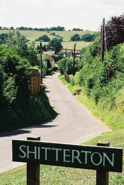 This approach road leads down to the picturesque hamlet of Shitterton.
