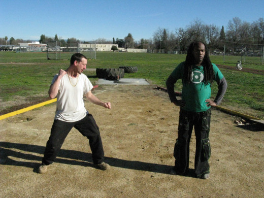 Jamie and Glenn demonstrate a Kenpo technique called the Back Breaker, against a surprise attack from the flank.