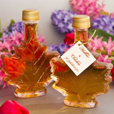 Maple syrup wedding favors in lovely maple leaf shaped bottles with personalized tags
