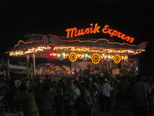 At the rodeo grounds, there is always a carnival that provides entertainment for kids of all ages.  There are also open bars, dancing areas (loud music) and food booths serving char-broiled meat (beef or mutton), fried rice, pizzas, papusas and more.
