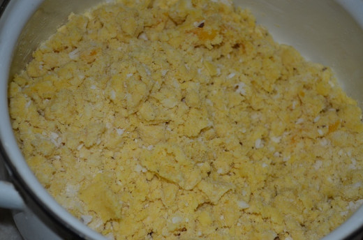 add coconut scrambling and jaggery water (filtered to remove the waste like stone etc)