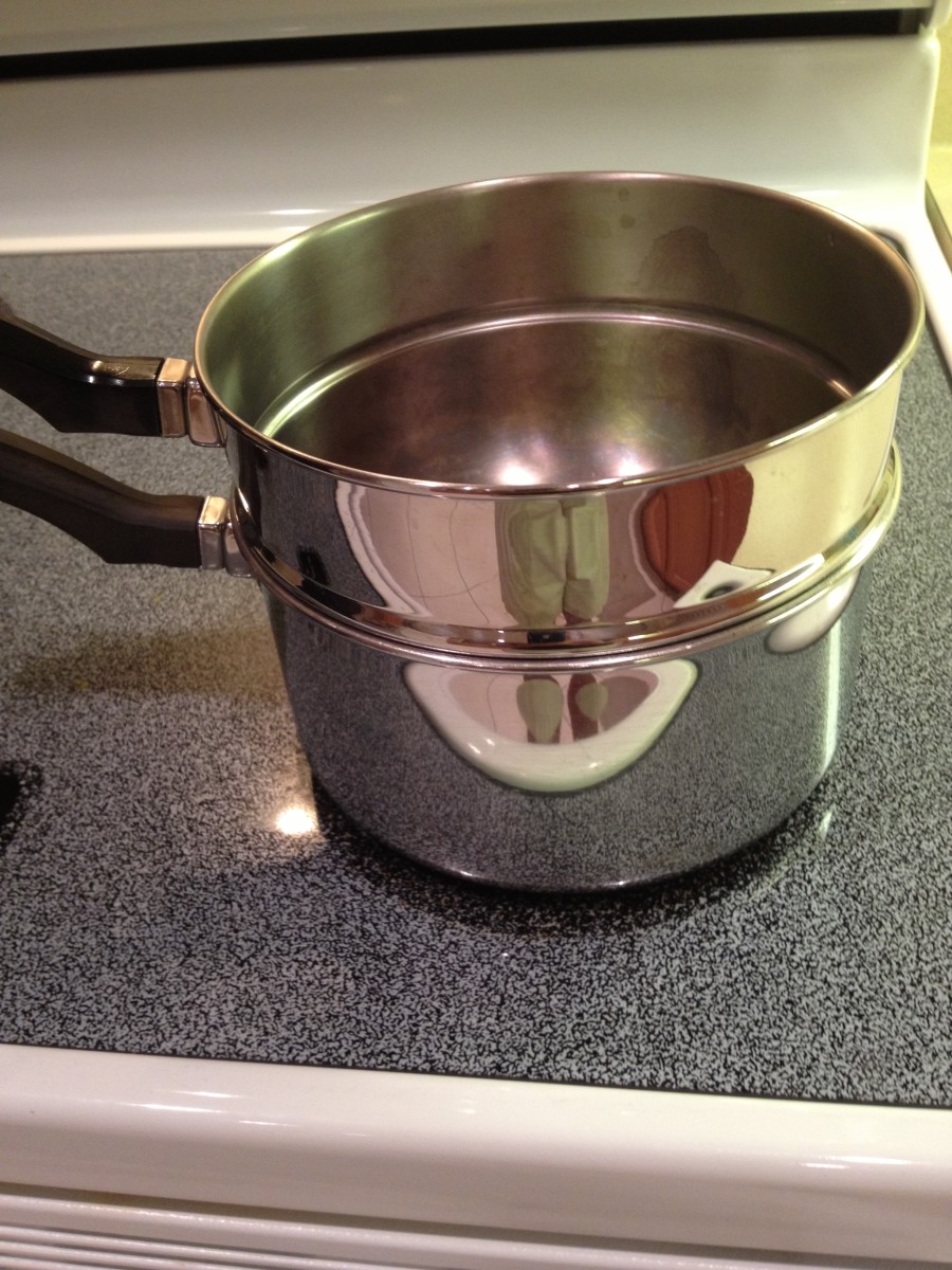 We use ordinary pots to melt the chocolate.  Make sure you do not overheat the chocolate -- it burns easily.  