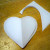 From the eighths cut patterns for a front and back piece (in this case two hearts), one smaller than the other. From the eighths cut patterns for a front and back piece (in this case two hearts), one smaller than the other.
