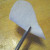 Fold the back piece (white heart) in half, and about three-quarters of the way from the top cut an approximately 1/2" slit, depending on the size of your craft stick. Fold the back piece (white heart) in half, and about three-quarters of the way from the top cut an approximately 1/2" slit, depending on the size of your craft stick.