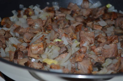 Add chopped beef to onion mixture.