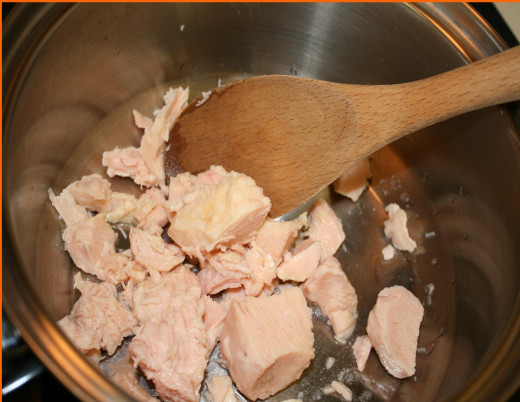 Warm the canned chicken first