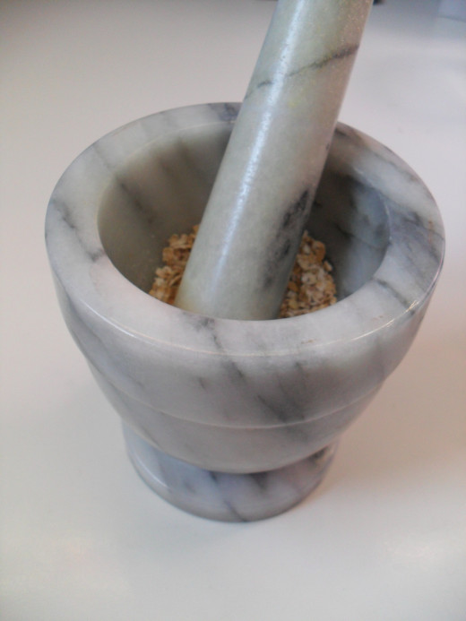 If you don't have a blender or food processor, you can use a mortar and pestle to grind up the oatmeal.