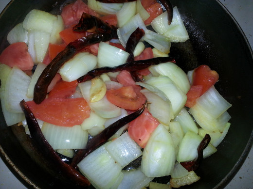 Light fry tomato, onion, ginger, garlic and red chillis