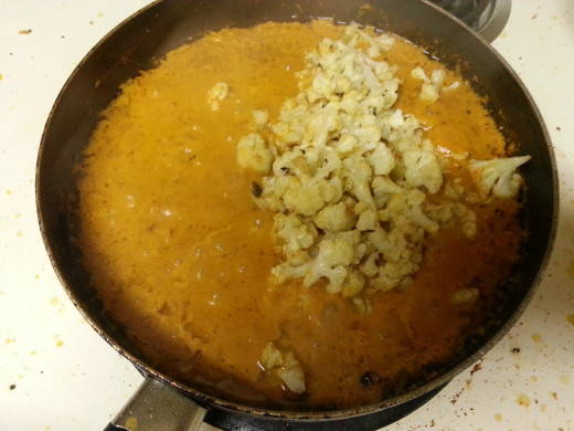Stiry fry the cream and add in Cauliflower and potatoes