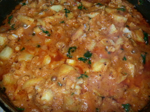 Garnish with Coriander and serve hot 