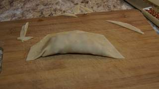 You can cut the excess dough if it starts to crack,.