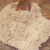Butter is crumbled into flour.
