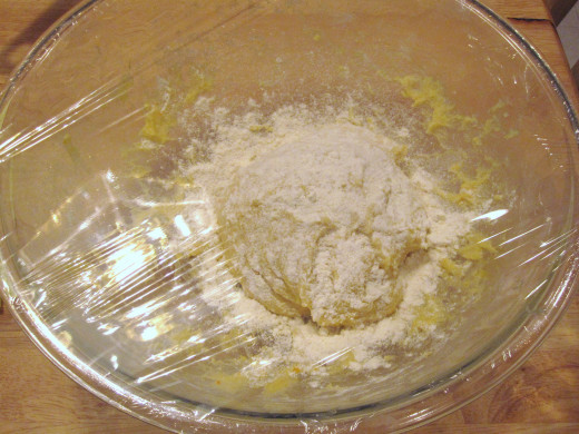 Sprinkled with flour, tightly wrapped and ready to rest for an hour.