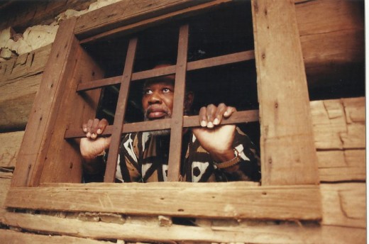 Jerry Gore depicts the view from the Slave Jail that was removed from its site near Maysville, Kentucky to become the centerpiece of the Freedom Center in Cincinnati.
