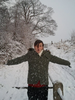 The Delight of A Child Playing in The Snow.