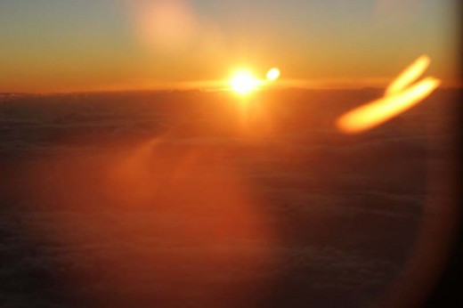 This photo was taken from an airplane at 30,000 feet clearly showing a second sun.